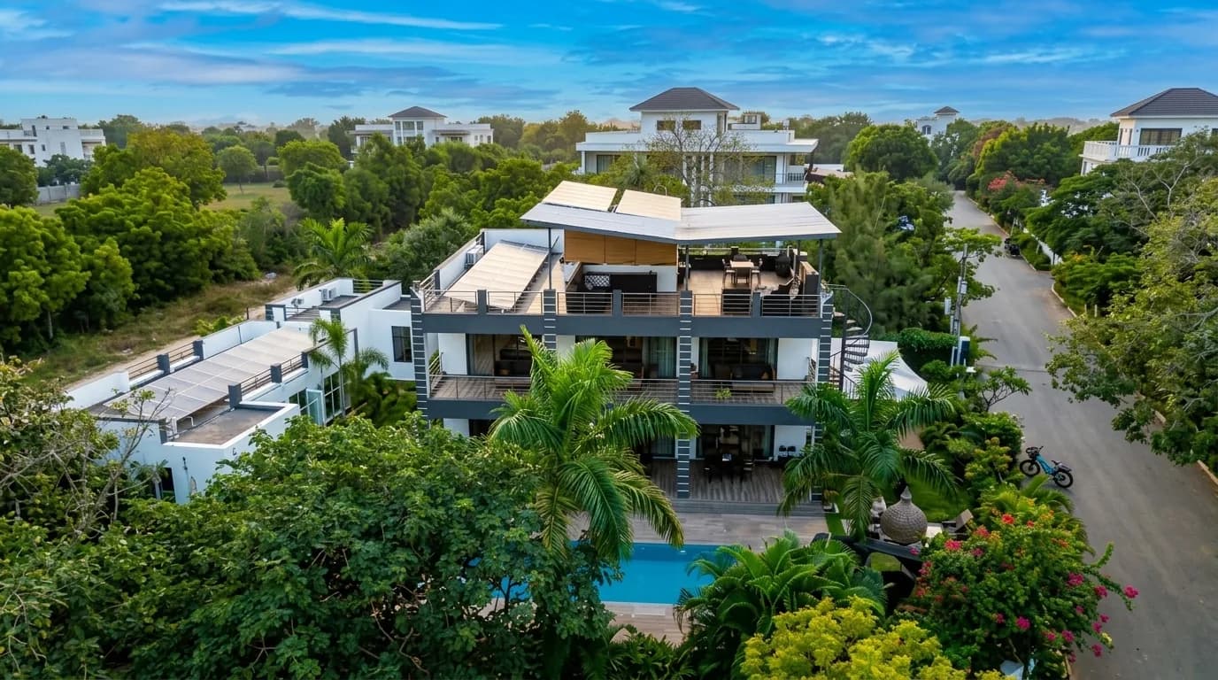 Aerial view of The Coastal Estate multistory villa compound and private swimming pool in Diani Beach The Coastal Estate - 4-Bedroom Luxury Villa Compound with Private Pool & Solar Grid in Diani Beach